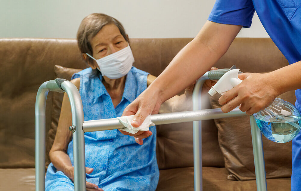 Moraine Ridge Senior Living Resident Getting Help with Walker with Caregiver