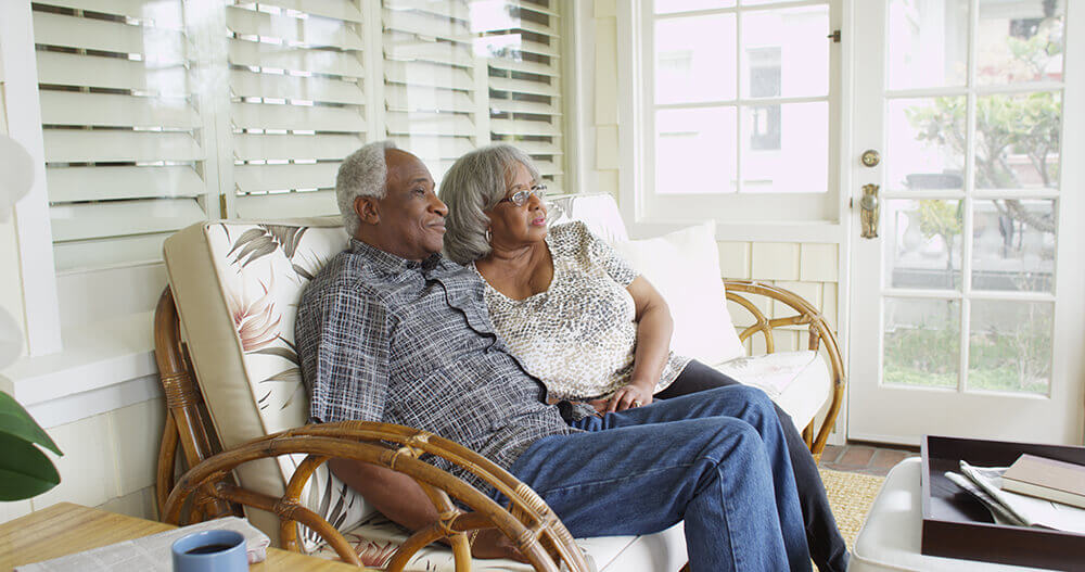 Senior Resident Couple Sitting Together